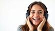 © miss irine - Happy young woman listening to music on headphones, smiling, laughing on white background. Studio portrait of attractive girl enjoying favorite song in earphones. Joyful face expression. Modern