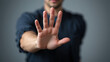 © Alexandra - person's hand showing palm gestures stop, concept violence, warning, refuse, defense, caution. the hand sign of men a stop