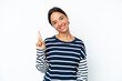 © luismolinero - Young hispanic woman isolated on white background showing and lifting a finger in sign of the best