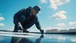 © ArpPSIqee - Roofing technician applying protective coating to a roof. Featuring roof repair and waterproofing