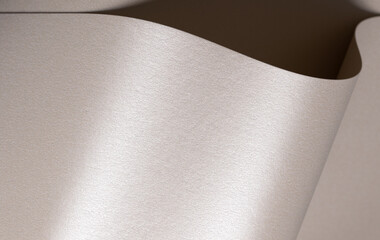 Aufkleber - Background with satin paper texture. Curved folded surface with pearlescent shimmer in champagne, beige, pale gold. Glossy gradient, soft tone, elegant premium finish, sculptural shape..