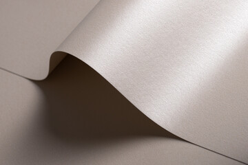 Aufkleber - Background with satin paper texture. Curved folded surface with pearlescent shimmer in champagne, beige, pale gold. Soft tone, elegant premium finish, sculptural minimal design..