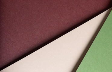 Aufkleber - Paper background with matte texture. Layered diagonal sheets in burgundy, maroon, champagne, soft beige, and pastel green tones, elegant modern composition, stylish gentle color balance..