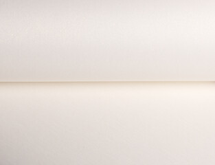 Fototapete - Paper background with pearlescent texture. Folded smooth surface in creamy white and ivory tones, subtle shimmer and reflective gloss, elegant minimal design, refined curved composition..