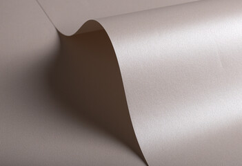 Aufkleber - Paper background with satin pearlescent texture. Glossy curved folds, smooth sculptural surface in pale gold and champagne hue, elegant abstract design with gentle flow and sheen..