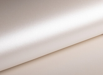 Aufkleber - Paper background with satin pearlescent texture. Glossy rolled surface, glowing soft gradient in pale gold and champagne hue, elegant abstract design with gentle flow and sculptural shine..
