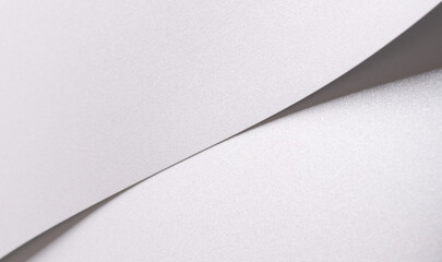 Aufkleber - White satin paper background with a pearlescent, glossy texture and layered, folded curves. Pale silver and icy grey tones create a soft, elegant, and luxurious abstract design with gentle shimmer