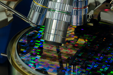 Poster - A disk with microchips is under a microscope
