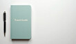 © Елена Троцкая - Travel guide booklet with pen on plain background, copy space