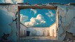 © VirtualVista - Window frame in a roofless deserted house with white walls set against a blue sky