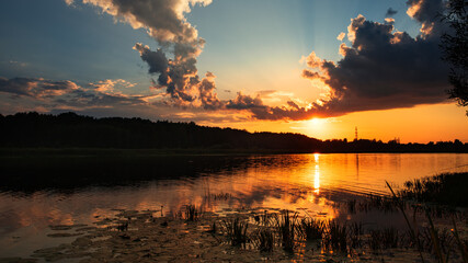 Wall Mural - summer sunset over the lake. summer or autumn landscape.