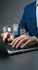 Contact Us Online: Man Typing on Laptop with Communication Icons - Email, Phone, Chat, Support, Connect & Digital Marketing Strategy