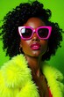 © chepZ - Stylish woman with curly hair wearing oversized pink sunglasses and a vibrant yellow fur coat