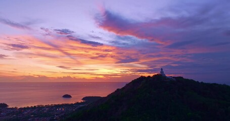 Wall Mural - Amazing sweet sky in sunrise at Phuket big Buddha. 
The beauty of the statue fits perfectly with the charming nature.
amazing pink sky in sweet sunset at Phuket big Buddha
