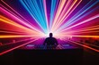 © Harsha - Silhouetted DJ at console, vibrant laser lights illuminate a crowded dance party.