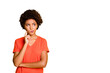 © deagreez - Photo of funny dark skin lady doubtful about making important decision wear orange v neck t-shirt isolated yellow color background