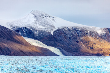 Wall Mural - closeup of the terminus of the nunatak glacier, which means lonely mountain in inuit, in geologfjord
