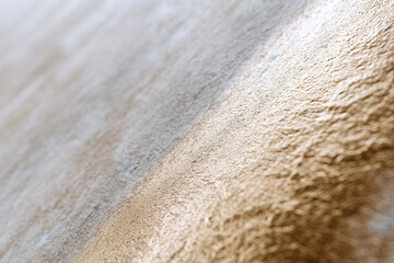 Poster - smooth, textured metallic surface with golden hue creates luxurious and elegant appearance