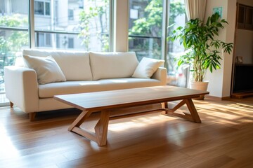 Poster - Soft natural sunlight fills a minimalistic room with a mid-century modern sofa and wooden coffee table, complemented by a large potted plant