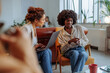 © bernardbodo - Businesswomen having a meeting in a cafeteria