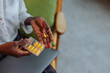© bernardbodo - Woman holding pills