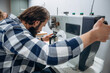 © standret - People are working by the sewing machines indoors