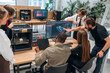 © standret - Business project, by computer. Designer team are together in the office