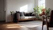 © AuraArt - Sunlight streams into a living room, illuminating a gray couch and lush plants.