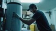 © Mcgui - Plumber installing a water heater in a utility room. Featuring expertise and efficiency