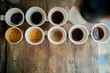 © Muhammad - Diverse coffee samples displayed in small cups.