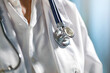 © magdal3na - Female doctor in white medical coat with stethoscope hanging around her neck. Close-up.