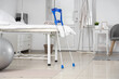 © Pixel-Shot - Interior of hospital ward with bed and crutches