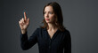 © MariaMedeiros - A woman interacting with a futuristic interface, touching a virtual screen with her finger.