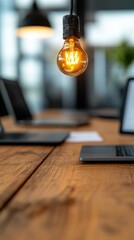 Leinwandbilder - Illuminating Innovation Vintage Edison Bulb Sparks Creative Workspace Design - Minimalist Tech Entrepreneurship and Modern Collaborative Inspiration