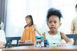 © DG PhotoStock - Group of diverse children enjoy learning about the STEM.