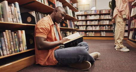 Poster - Black man, reading book and floor in library for literature, research and studying for knowledge. Person, student and novel with academic information, scholarship and learning of education assignment