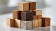 © KohXD - Stacked wooden blocks forming a unique structure symbolizing personal mission and purpose in a creative environment