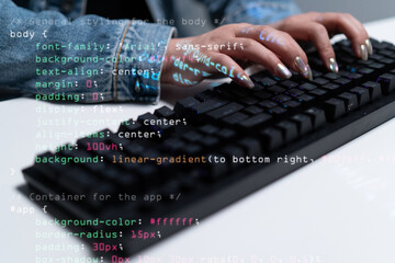 developer typing code on keyboard, showcasing software engineering and coding skills with focus on programming. screen displays colorful code snippets. coding developer software engineer
