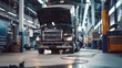 © soem - Semi-truck with open hood undergoing maintenance at a service bay.
