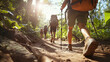 © Oleksandr - Hikers walking on a trail through the Amazon rainforest on a sunny day, carrying backpacks and using trekking poles