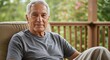 © El_design - Elderly man relaxing on porch