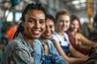 © Baba Images - Portrait of a smiling group of diverse female workers in factory