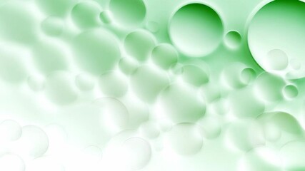 Green spheres are floating and moving gently on a white background