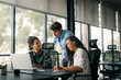 © NDABCREATIVITY - Success group of multiethnic entrepreneurs and business people achieving goals in corporate office
