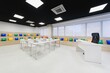 © ADDICTIVE STOCK - Modern training room with colorful wall cushions and tables