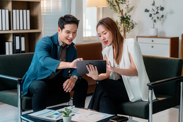 Poster - Asian businesspeople discussing and using tablet in office