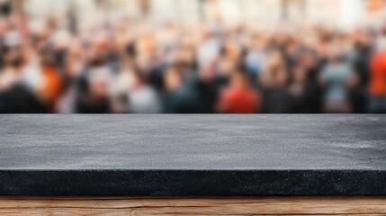 Aufkleber - Empty black table showcasing blurred stadium crowd in vibrant colors