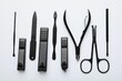 © New Africa - Set of different manicure tools on white background, flat lay