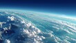 © Inkwell Imagery - Dramatic view of Earth's curvature from high altitude showcasing clouds and ocean