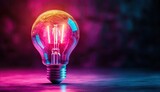 Glowing lightbulb on dark background with vibrant pink and blue lighting